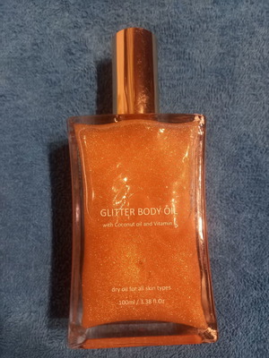 Λάδι σώματος Glitter με coconut oil και βιταμίνη Ε νέο