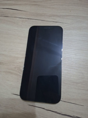 iPhone 12 Pro smartphone with 80% battery health, case included