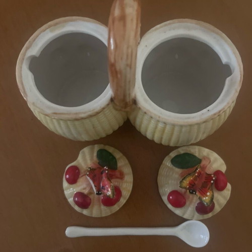 Ceramic jam pots used with spoons and decorative butterfly