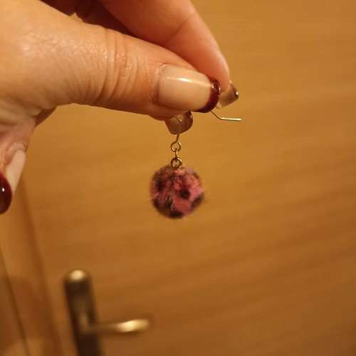 Pon pon animal print fuchsia earrings used