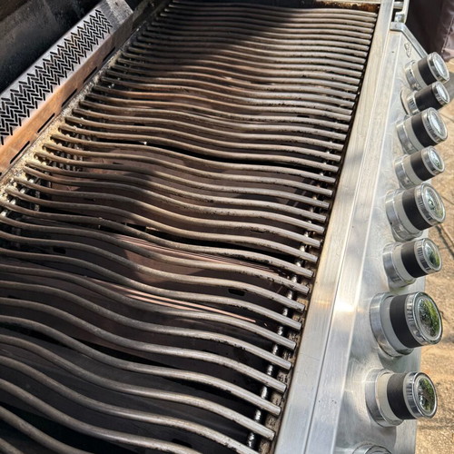 Napoleon Prestige Pro 665 gas grill used with hood and rotisserie