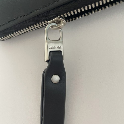 Calvin Klein graphic wristlet pouch, black and yellow