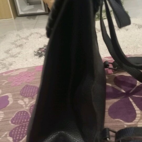 Black synthetic backpack bag used