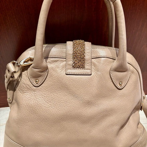 Uterque handbag like new, nude beige with gold details