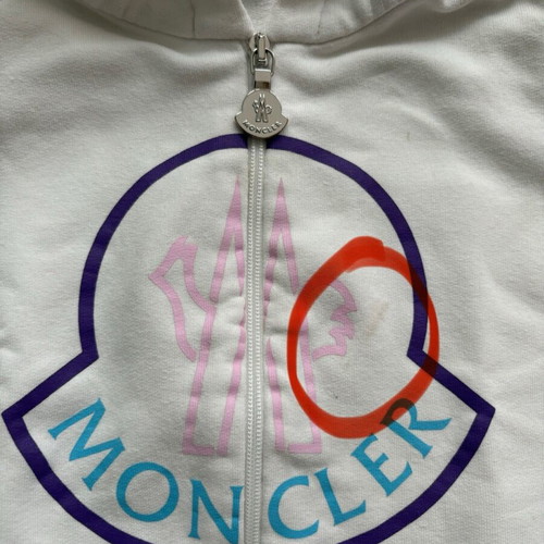 Moncler jacket like new, 12 months, with small stain