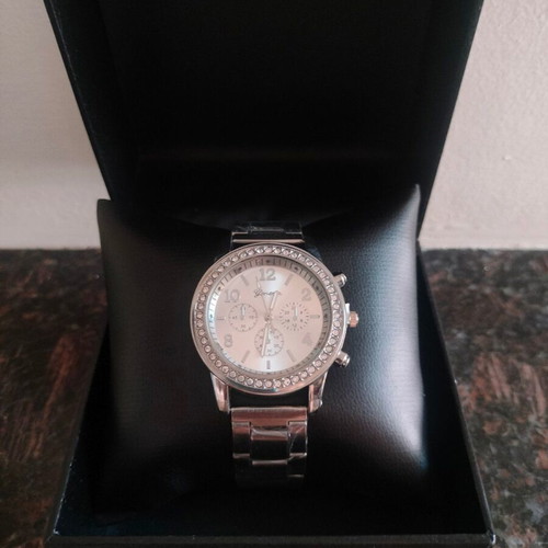 Geneva women's silver watch with metal bracelet