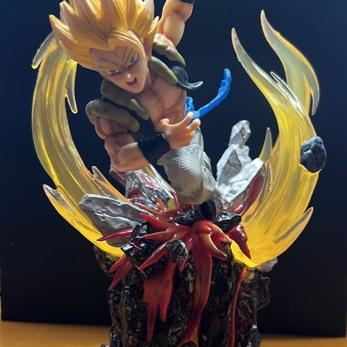 Dragonball figure in battle scene with effects new