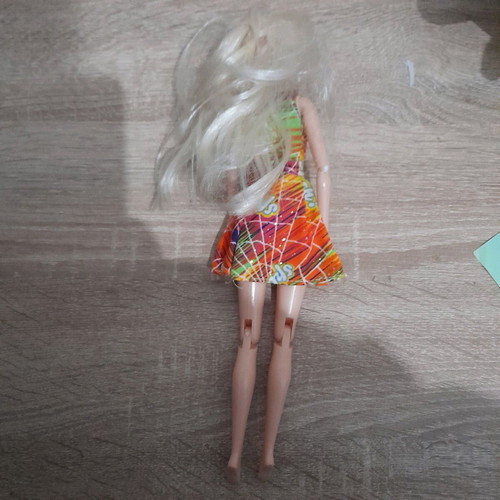 Barbie doll used