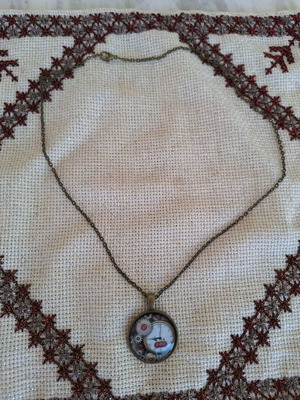 Short necklace with clock design new, bronze pendant with glass