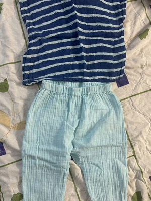 Baby cotton muslin set with striped short-sleeve top and light blue pants