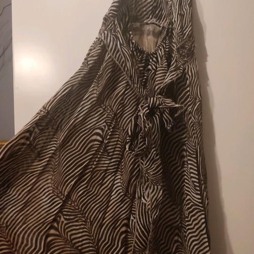 Tiger print dress used, backless, size M