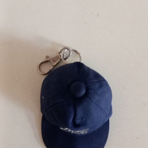 Collectible keychain in hat shape like new