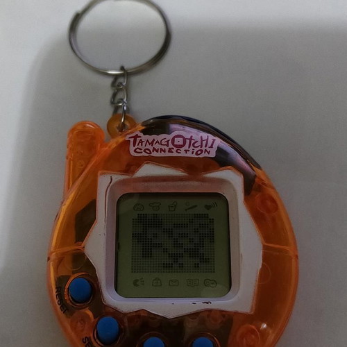Tamagotchi Connection Orange Transparent like new