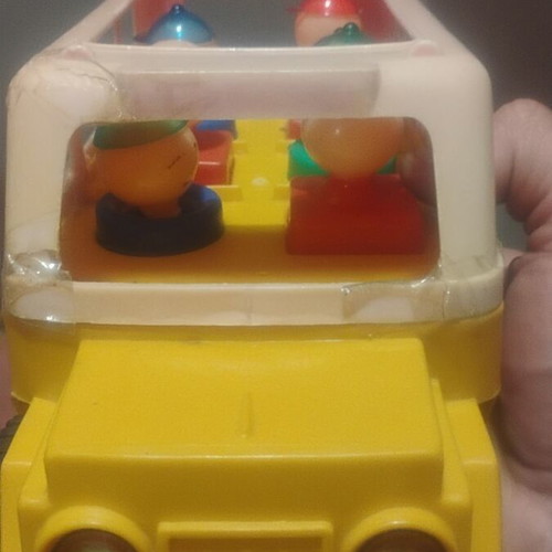 School bus toy used, old with damages