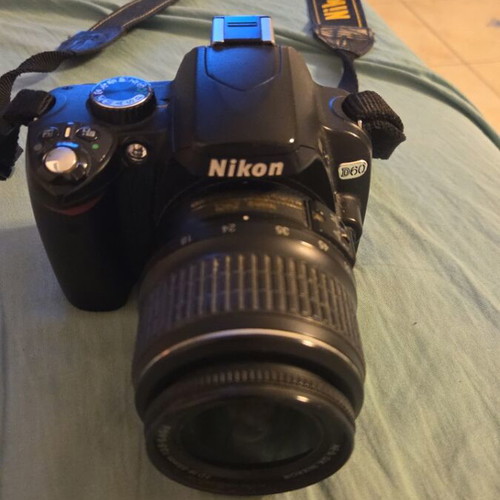Nikon DSLR model D60 camera used with Nikon Aspherical lens