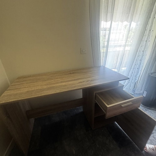 Wooden desk with drawer and open storage, brown oak finish