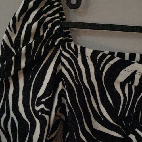 Zebra print blouse new, animal print with puffed shoulder, size S
