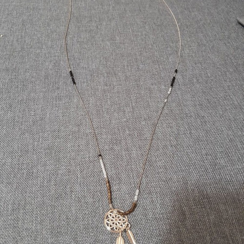 Necklace used, thin long, black and gold