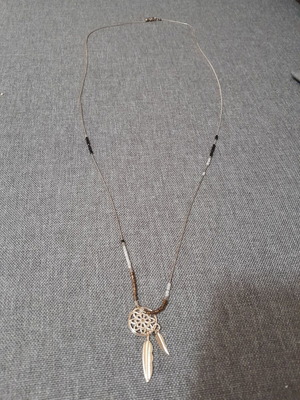 Necklace used, thin long, black and gold