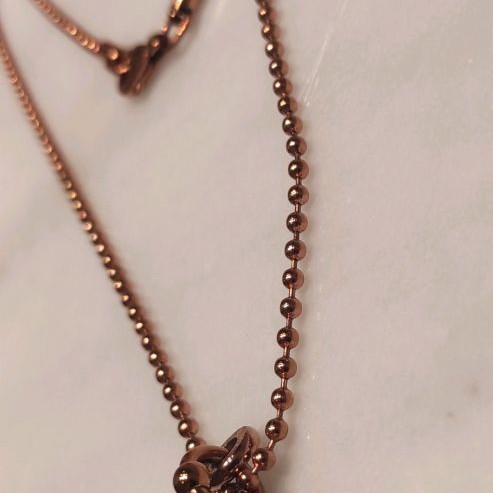 Folli Follie necklace used pink gold plated oval cross with floral design