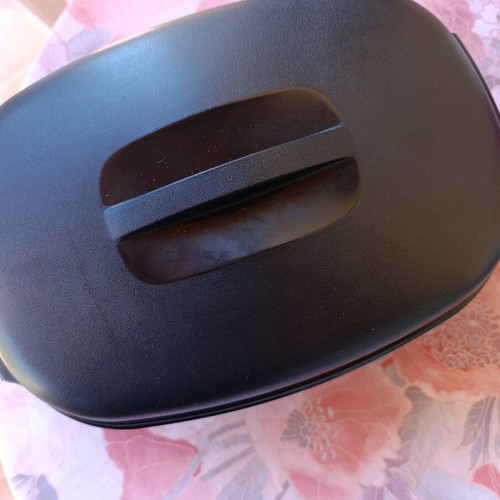 Oval Tupperware server with strainer new, black and green