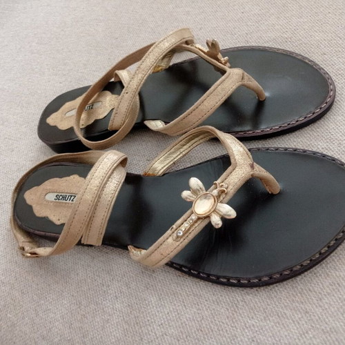 Schutz sandals new, gold color with ankle cords, size 37