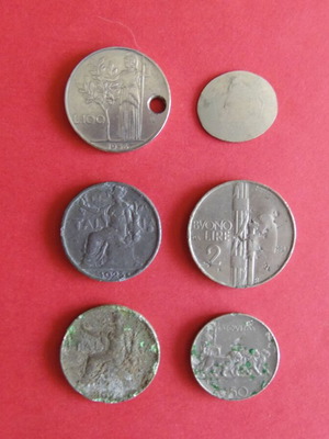 Problematic coins used with hole and corrosion