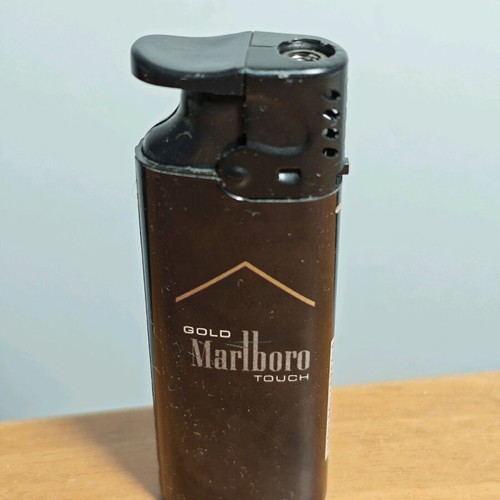 Marlboro collectible windproof lighter used, functional