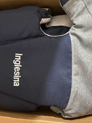 Inglesina blue baby carrier like new with waterproof fabric