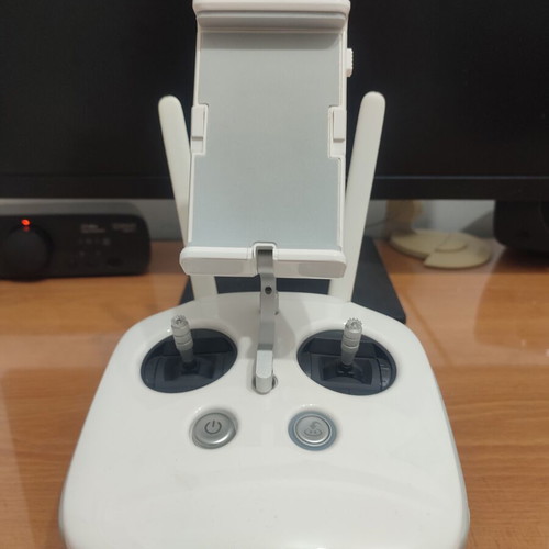 DJI Phantom 4 drone with accessories (no working batteries)