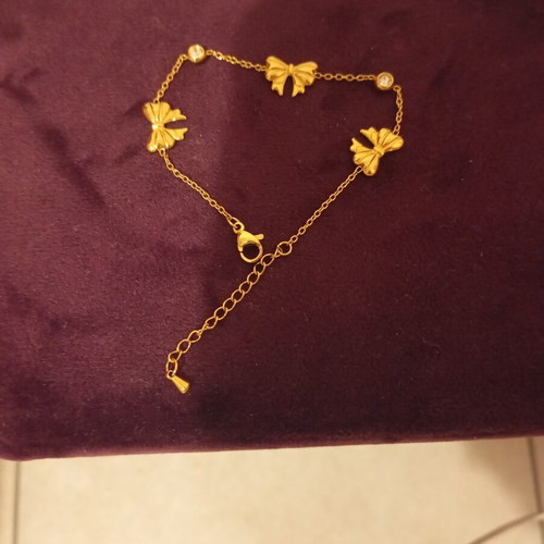Steel bracelet like new, gold tone