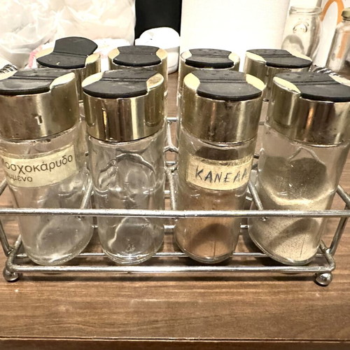 Vintage spice set with metal rack and 8 glass jars used