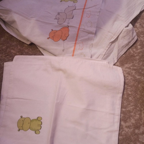 Baby crib sheet set like new with pillowcase and colorful hippos