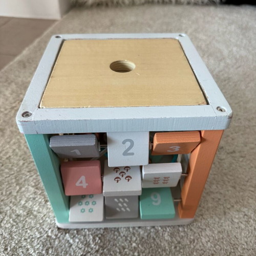 Gerardo's wooden activity cube used