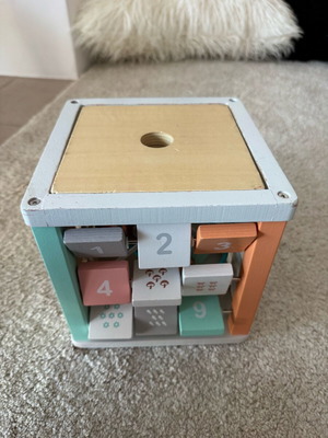 Gerardo's wooden activity cube used