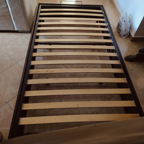 Bed with headboard and storage mechanism, 210x110 cm
