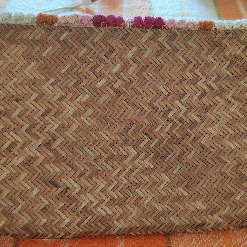 Oysho straw handbag used with boho pom pom design