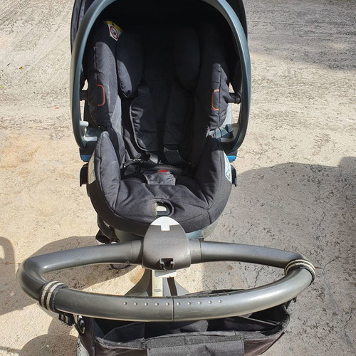 Stokke Xplory stroller used with port bebe, footmuff, bag, umbrella, mosquito net, rain cover