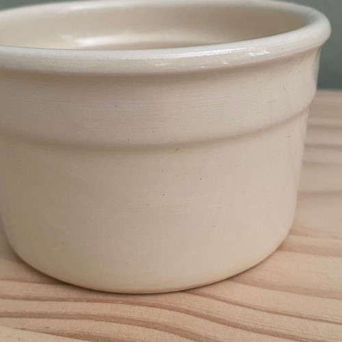 Small beige ceramic bowl used