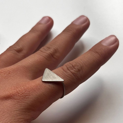 Triangular brass ring like new with thin band and textured finish