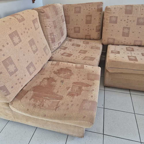 Corner sofa used, beige fabric, sturdy construction