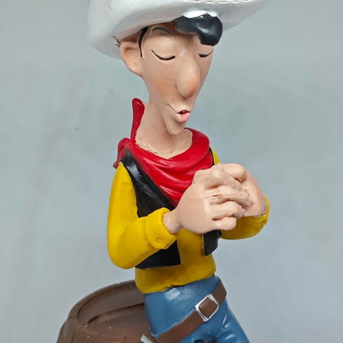 Lucky Luke collectible figure in barrel like new 19cm