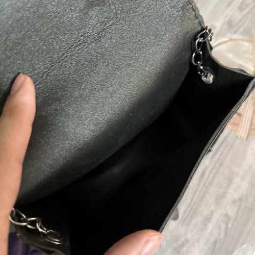 Women's black shoulder bag with geometric design, like new