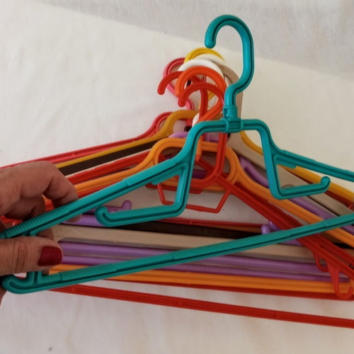 Plastic hangers used, pack of 10, large colorful