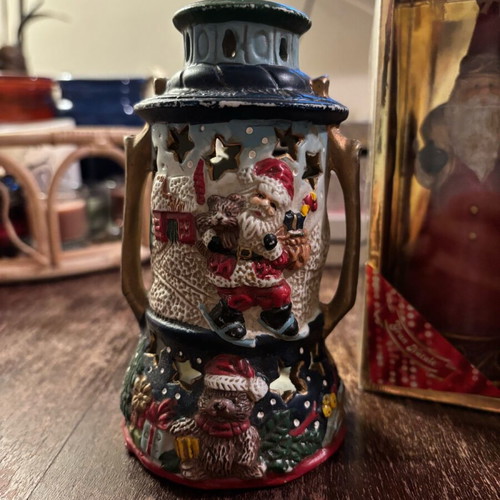 Santa Claus candles and ceramic lantern lightly used