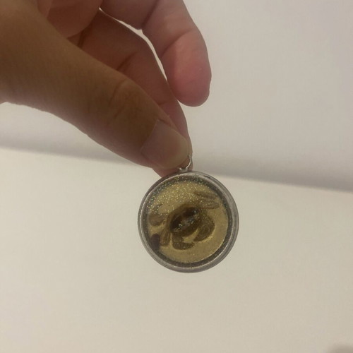 Handmade pendant like new with resin and glitter