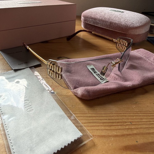 Miu Miu sunglasses, grey and gold