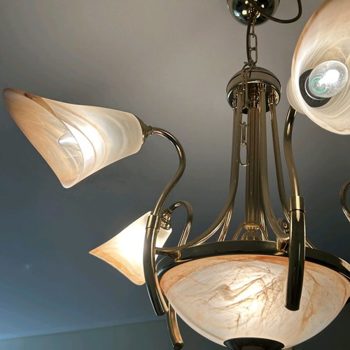 Ceiling chandelier used with handmade glass and bronze