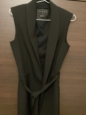 Lynne black sleeveless vest with fabric belt, size 40