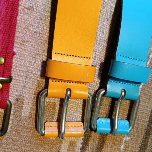 Three Benetton belts used, two leather and one fabric
